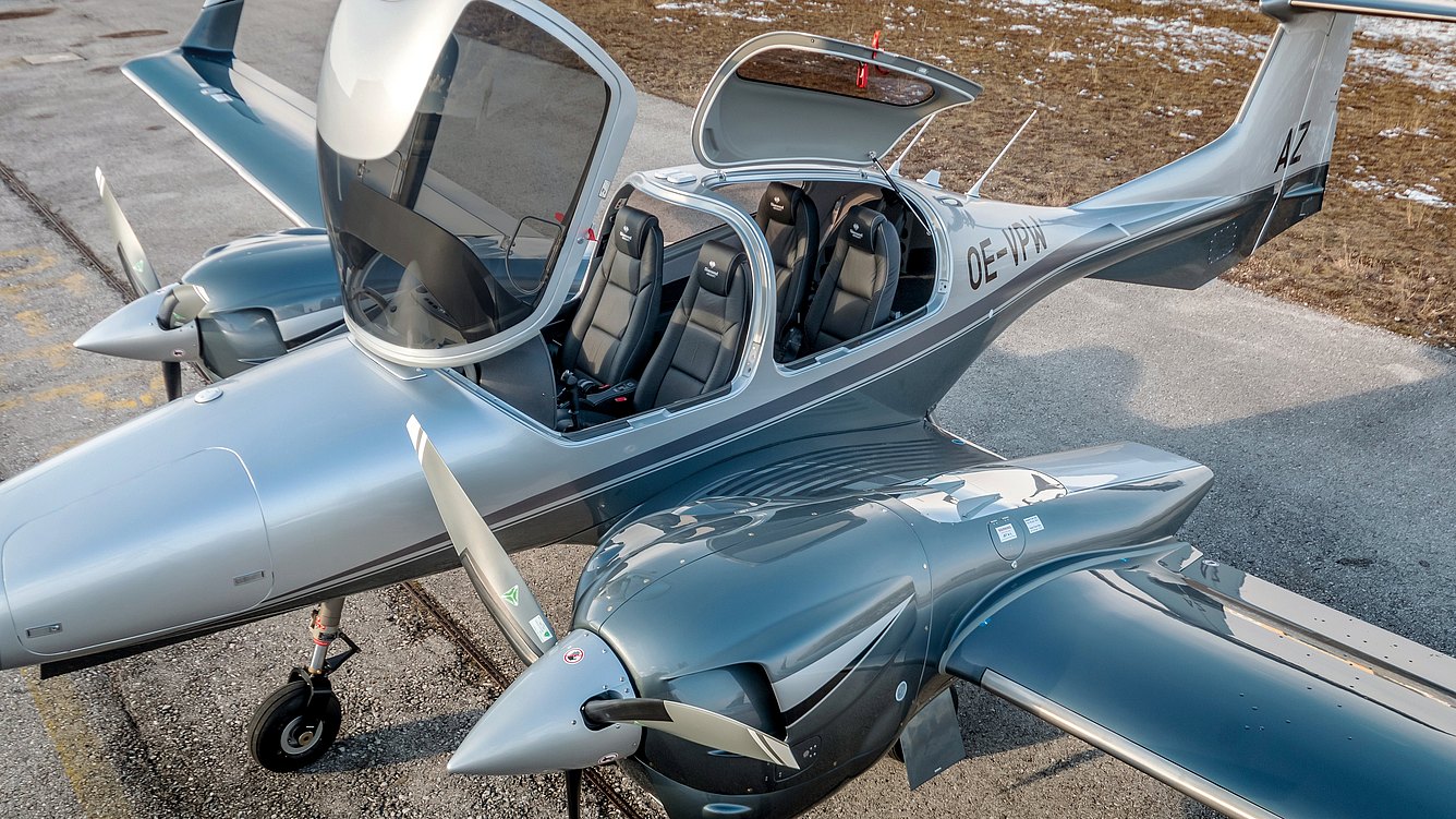Switchblade in ground mode with open canopy exposing dual controls, steering wheel, and aviation instruments before transformation.