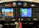 Airplane cockpit instrument panel with Garmin glass avionics, dual displays and GPS navigation map