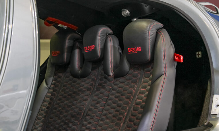 Diamond DA50 RG luxury aircraft interior with black leather rear seats and red contrast stitching